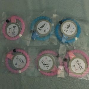 4 pink 2 blue lokai bracelets :) for addison